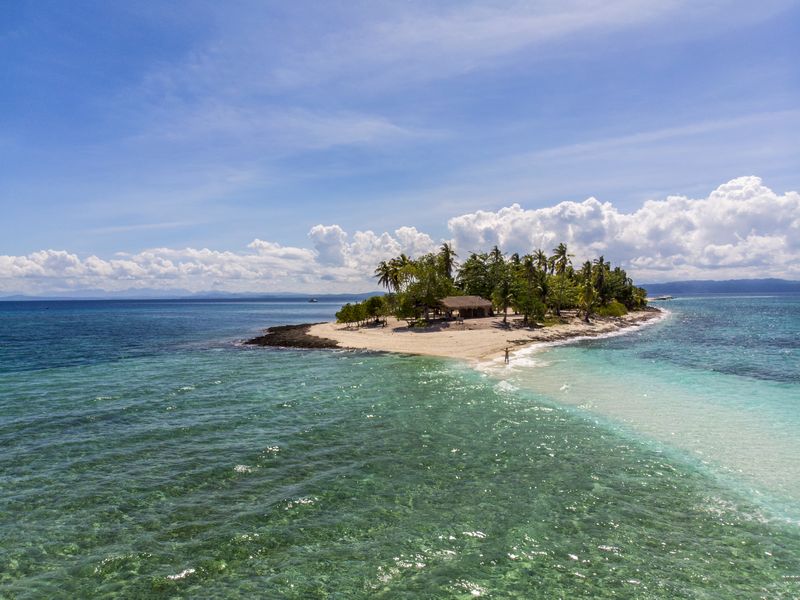 A white sandbar island in turquoise water, the Visayas